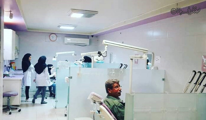 عصب کشی همراه با ترمیم دندان در مرکز دندانپزشکی عارف 