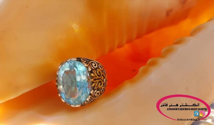 انگشتر نقره با عیار ۹۲۵ نگین زیبای توپاز آبی سوییسی